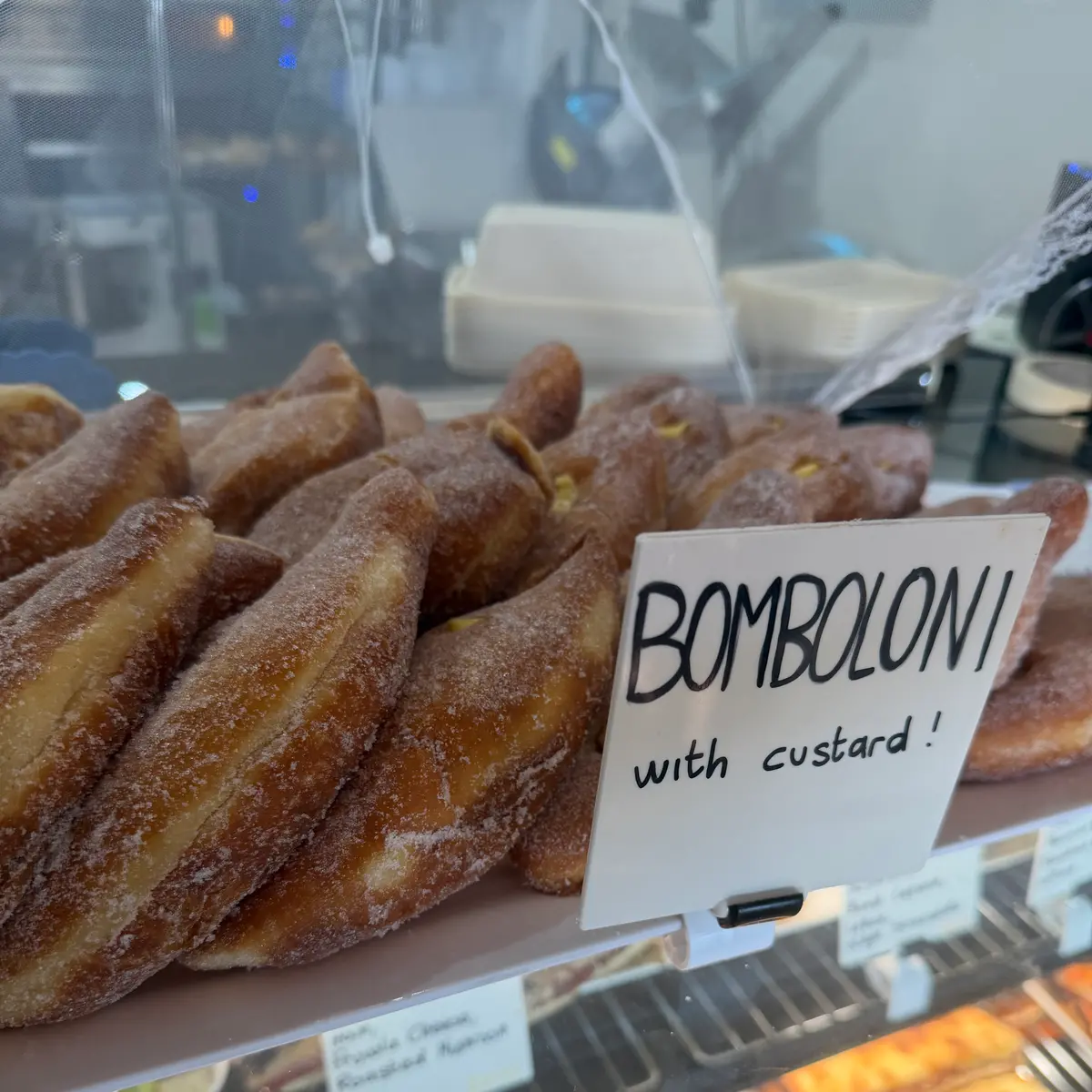 Custard bomboloni in the shop display